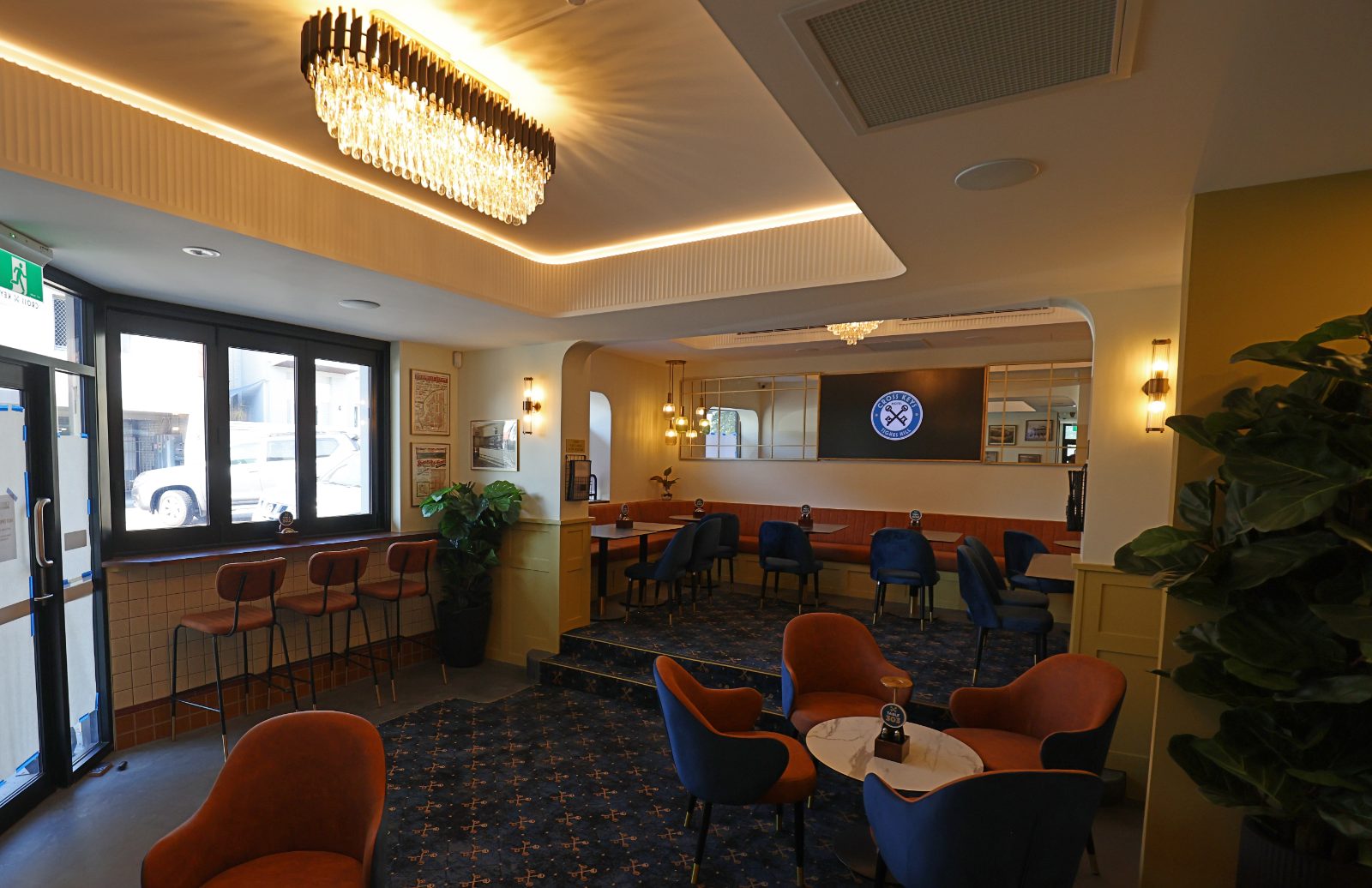 Front lounge at Cross Keys Hotel with commercial carpet installed to tiered seating areas